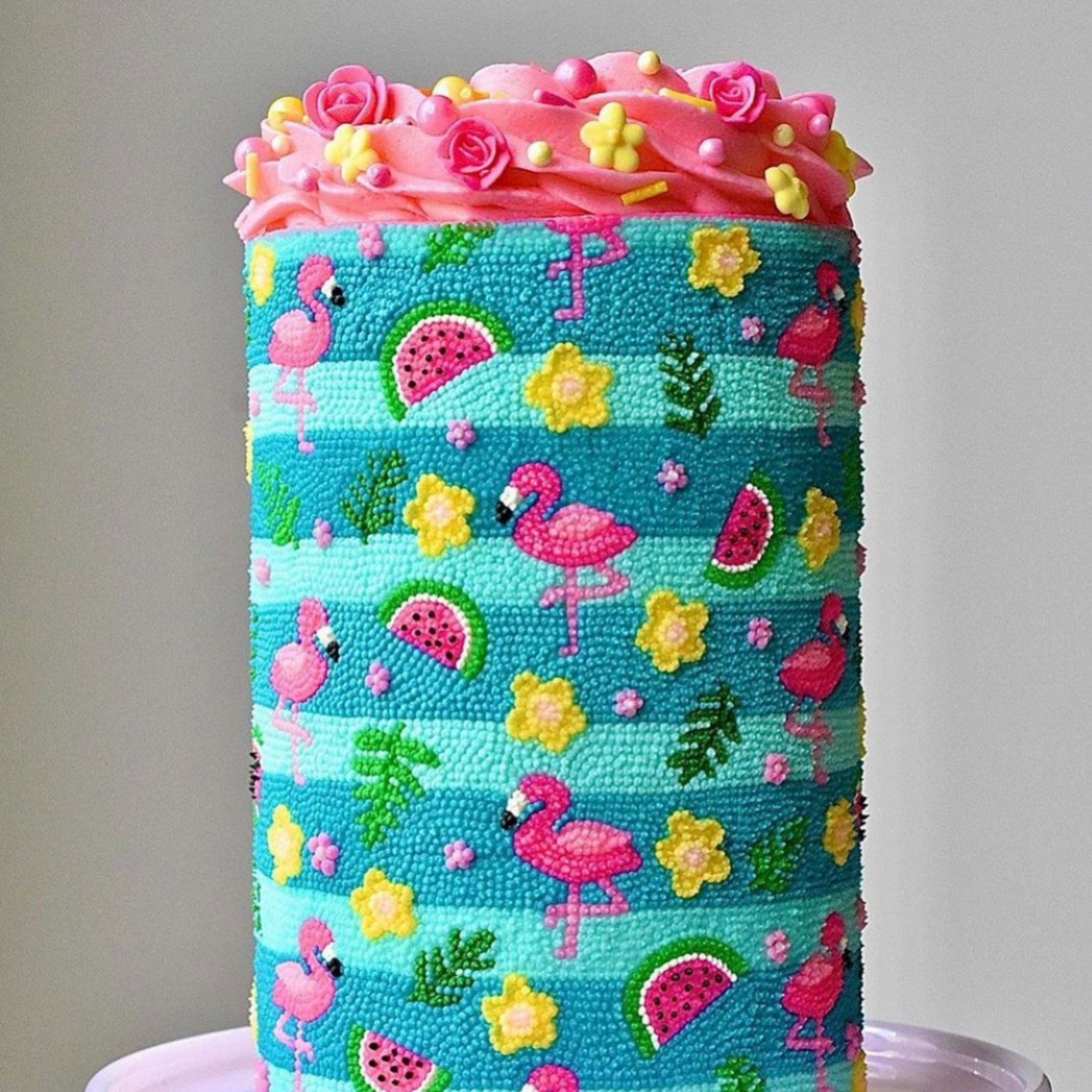 Pink Lemonade Icing Flowers on a Cake